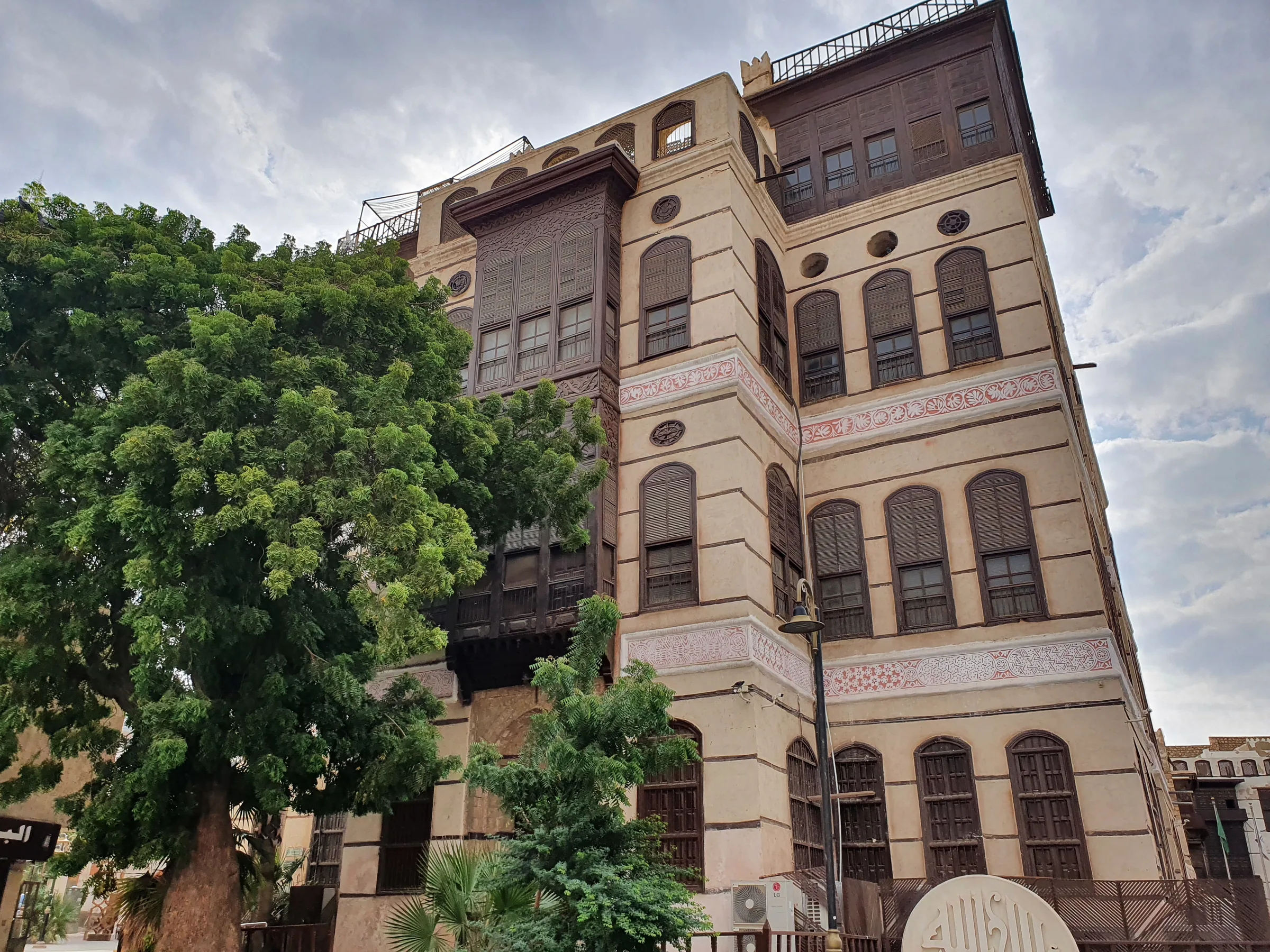 Naseef House (Bayt Nasif), a tall coral-stone mansion with carved wooden shutters in Jeddah's Al-Balad old town